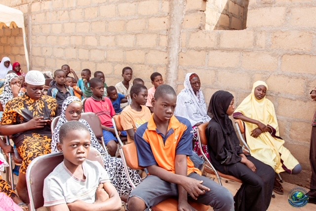 Orphans and widows seated together at the WHSF event