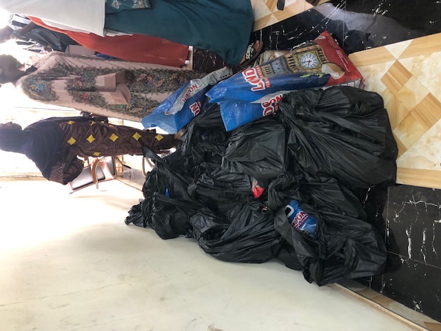 Stacked food and supply packages ready to be handed out